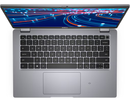 Silver Dell Latitude 5420 laptop with black keyboard and HD display showing abstract blue and red light streaks.