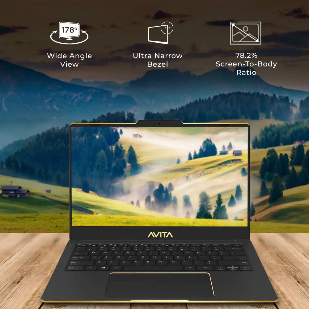 Black Avita Liber V laptop with slim bezels, wide HD display showing a misty mountain landscape.