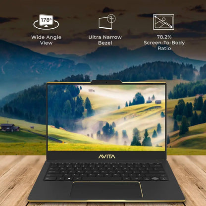 Black Avita Liber V laptop with slim bezels, wide HD display showing a misty mountain landscape.