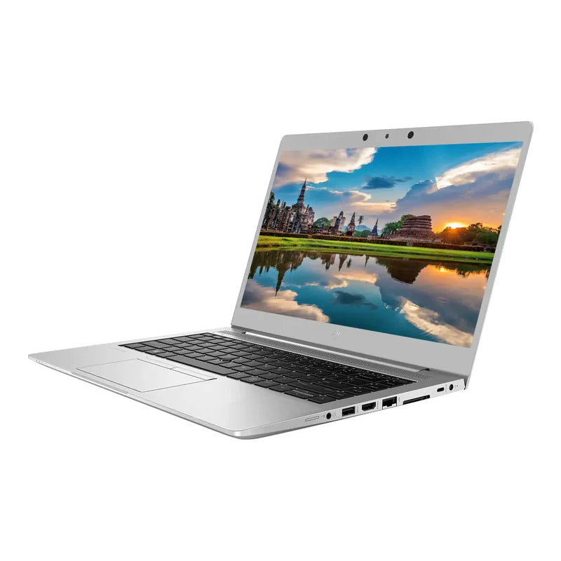 Silver HP EliteBook 14-inch laptop with thin bezel, black keyboard, and cityscape sunset on screen.